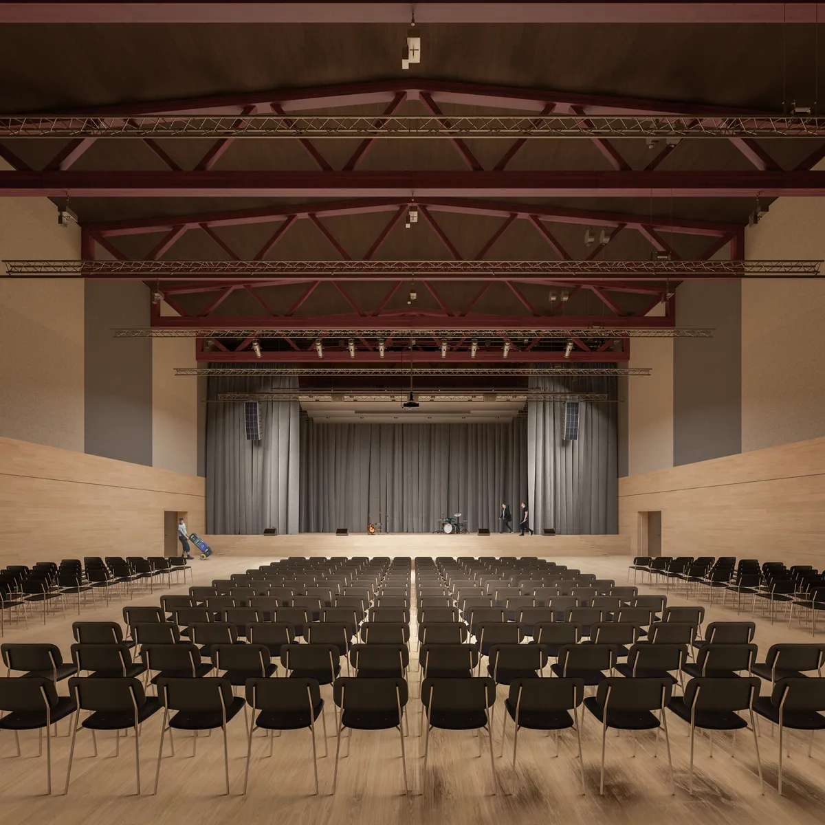 Bild eines bestuhlten Saals mit Bühne.